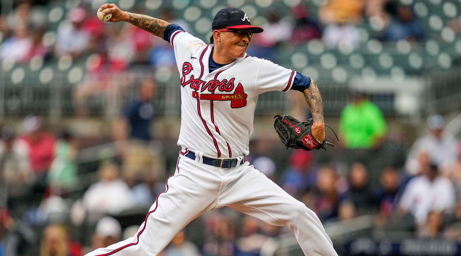 Sep 4, 2022; Cumberland, Georgia, USA; Atlanta Braves relief pitcher Jesse Chavez (60) pitches against the Miami Marlins during the sixth inning at Truist Park.